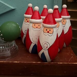 Wooden bowling pen, Santas and bowling ball excellent condition